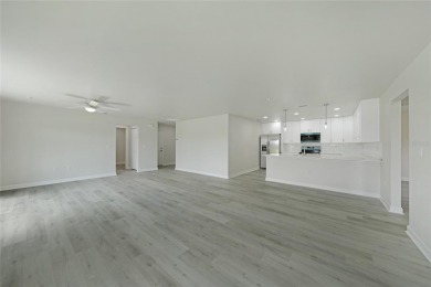 This nearly completed WATERFRONT TRIPLEX in Rotonda West, FL, is on Rotonda Golf and Country Club The Palms Course in Florida - for sale on GolfHomes.com, golf home, golf lot