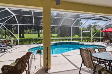 Tucked away in the prestigious PGA Village, where lush fairways on The Legacy Golf and Tennis Club in Florida - for sale on GolfHomes.com, golf home, golf lot