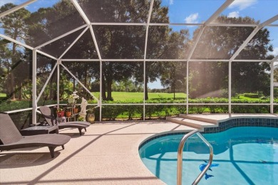 Tucked away in the prestigious PGA Village, where lush fairways on The Legacy Golf and Tennis Club in Florida - for sale on GolfHomes.com, golf home, golf lot