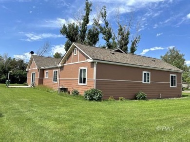 Location, location, location! This single-level home sits on a on Miles City Town and Country Club in Montana - for sale on GolfHomes.com, golf home, golf lot