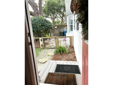 This adorable cottage has an updated kitchen, flooring, outdoor on Sea Island Golf Club in Georgia - for sale on GolfHomes.com, golf home, golf lot