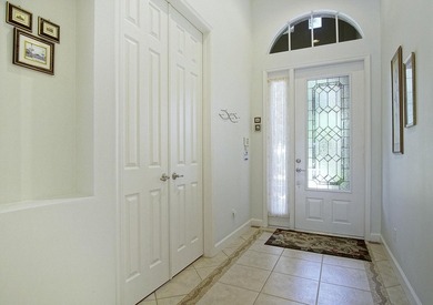 LAKEFRONT POOL HOME THAT OFFERS GREAT PRIVACY AND GREENSPACE! on The Legacy Golf and Tennis Club in Florida - for sale on GolfHomes.com, golf home, golf lot