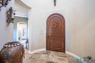 This stunning Tuscany-style home in the Turtleback Mountain on Sierra Del Rio Golf Club in New Mexico - for sale on GolfHomes.com, golf home, golf lot