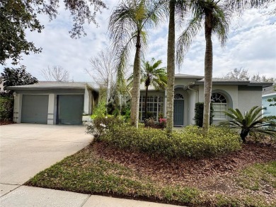 This beautifully maintained 4-bedroom home has been lovingly on Hunters Green Country Club in Florida - for sale on GolfHomes.com, golf home, golf lot