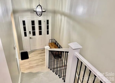 GREAT RENTAL HISTORY on this recently renovated townhome with a on Rumbling Bald Resort on Lake Lure in North Carolina - for sale on GolfHomes.com, golf home, golf lot