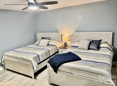 GREAT RENTAL HISTORY on this recently renovated townhome with a on Rumbling Bald Resort on Lake Lure in North Carolina - for sale on GolfHomes.com, golf home, golf lot