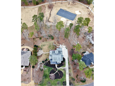 Welcome to 53 Davis Love Drive, an exceptional golf course on The Preserve At Jordan Lake Golf Club in North Carolina - for sale on GolfHomes.com, golf home, golf lot