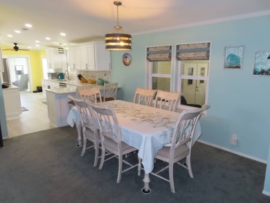 Watch the sunrise or just relax in your glass enclosed 4 season on Crane Lakes Golf and Country Club in Florida - for sale on GolfHomes.com, golf home, golf lot