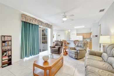 This beautifully maintained 4-bedroom home has been lovingly on Hunters Green Country Club in Florida - for sale on GolfHomes.com, golf home, golf lot