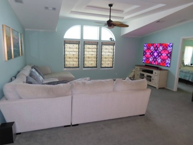 Watch the sunrise or just relax in your glass enclosed 4 season on Crane Lakes Golf and Country Club in Florida - for sale on GolfHomes.com, golf home, golf lot