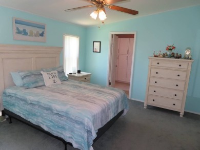 Watch the sunrise or just relax in your glass enclosed 4 season on Crane Lakes Golf and Country Club in Florida - for sale on GolfHomes.com, golf home, golf lot