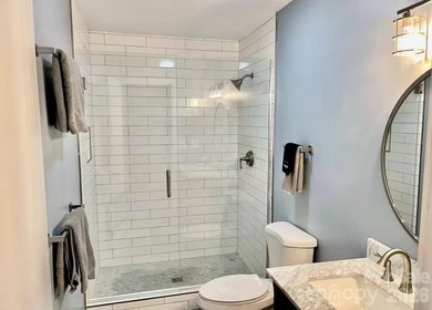 GREAT RENTAL HISTORY on this recently renovated townhome with a on Rumbling Bald Resort on Lake Lure in North Carolina - for sale on GolfHomes.com, golf home, golf lot