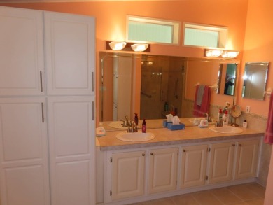 Watch the sunrise or just relax in your glass enclosed 4 season on Crane Lakes Golf and Country Club in Florida - for sale on GolfHomes.com, golf home, golf lot