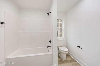 Welcome to 284 Longleaf Drive, a custom new construction home in on Beacon Ridge Golf and Country Club in North Carolina - for sale on GolfHomes.com, golf home, golf lot