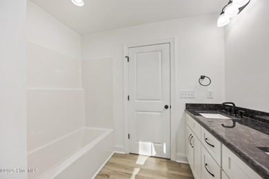 Welcome to 284 Longleaf Drive, a custom new construction home in on Beacon Ridge Golf and Country Club in North Carolina - for sale on GolfHomes.com, golf home, golf lot