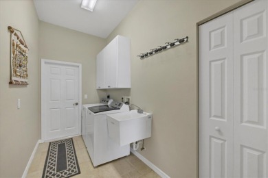 Experience the tranquility of panoramic waterfront living on on Rotonda Golf and Country Club The Links Course in Florida - for sale on GolfHomes.com, golf home, golf lot