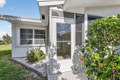 Lake & fountain views from both bedrooms & patio. Front patio & on Cypress Lakes Golf Course - West Palm Beach in Florida - for sale on GolfHomes.com, golf home, golf lot