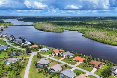Experience the tranquility of panoramic waterfront living on on Rotonda Golf and Country Club The Links Course in Florida - for sale on GolfHomes.com, golf home, golf lot