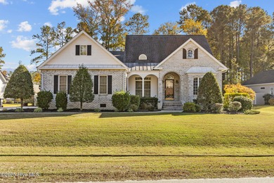 This custom-built brick home has been exceptionally cared for on Brunswick Plantation and Golf Resorts in North Carolina - for sale on GolfHomes.com, golf home, golf lot