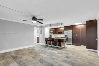 Updated 2 Bedroom 1 Bath with washer and Dryer in unit. Miami on Don Shulas Golf Course and Club in Florida - for sale on GolfHomes.com, golf home, golf lot