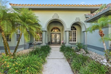 Welcome to this exceptional Costanza custom-built home on Tarpon Woods Golf Club in Florida - for sale on GolfHomes.com, golf home, golf lot