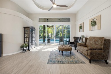 Welcome to this exceptional Costanza custom-built home on Tarpon Woods Golf Club in Florida - for sale on GolfHomes.com, golf home, golf lot