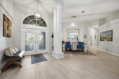 Welcome to this exceptional Costanza custom-built home on Tarpon Woods Golf Club in Florida - for sale on GolfHomes.com, golf home, golf lot