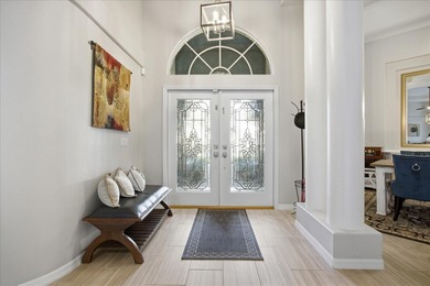 Welcome to this exceptional Costanza custom-built home on Tarpon Woods Golf Club in Florida - for sale on GolfHomes.com, golf home, golf lot