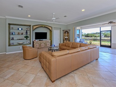 Enjoy the best of Florida style living in this WCI Ghiberti on Venetian Golf and River Club in Florida - for sale on GolfHomes.com, golf home, golf lot