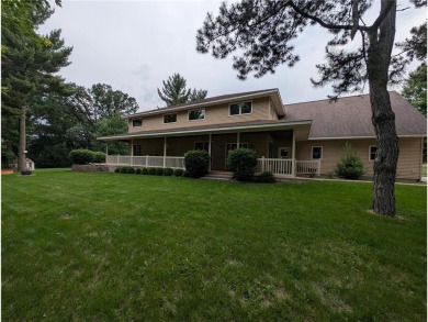 Stunning 4-bedroom, 3-bathroom home offering nearly 5,000 sq ft on Zumbrota Golf Club in Minnesota - for sale on GolfHomes.com, golf home, golf lot