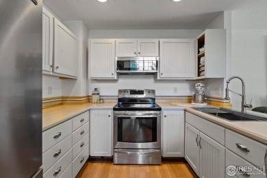 Beautiful end-unit townhome in sought-after Water Valley with a on Pelican Lakes Golf and Country Club in Colorado - for sale on GolfHomes.com, golf home, golf lot