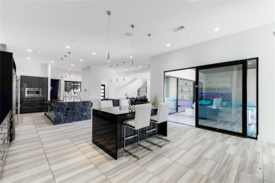 This ultra-modern smart home, on a rare double golf course lot on The Trails of Frisco Golf Club in Texas - for sale on GolfHomes.com, golf home, golf lot