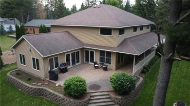 Stunning 4-bedroom, 3-bathroom home offering nearly 5,000 sq ft on Zumbrota Golf Club in Minnesota - for sale on GolfHomes.com, golf home, golf lot