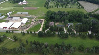 Stunning 4-bedroom, 3-bathroom home offering nearly 5,000 sq ft on Zumbrota Golf Club in Minnesota - for sale on GolfHomes.com, golf home, golf lot