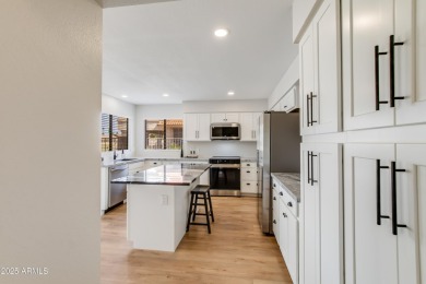 An exquisite remodel in the community of Fairway Ridge in on Westbrook Village Golf Club in Arizona - for sale on GolfHomes.com, golf home, golf lot