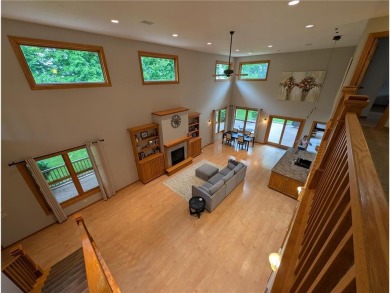 Stunning 4-bedroom, 3-bathroom home offering nearly 5,000 sq ft on Zumbrota Golf Club in Minnesota - for sale on GolfHomes.com, golf home, golf lot