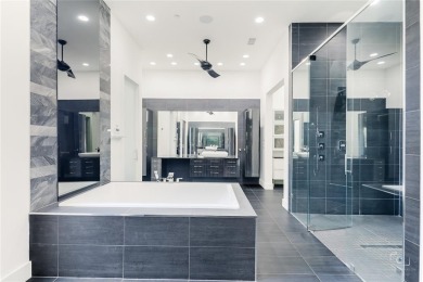 This ultra-modern smart home, on a rare double golf course lot on The Trails of Frisco Golf Club in Texas - for sale on GolfHomes.com, golf home, golf lot