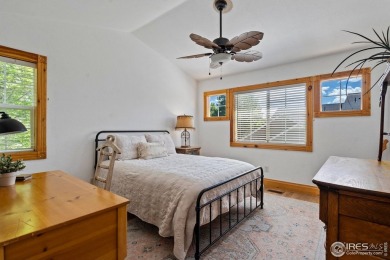 Beautiful end-unit townhome in sought-after Water Valley with a on Pelican Lakes Golf and Country Club in Colorado - for sale on GolfHomes.com, golf home, golf lot