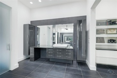 This ultra-modern smart home, on a rare double golf course lot on The Trails of Frisco Golf Club in Texas - for sale on GolfHomes.com, golf home, golf lot