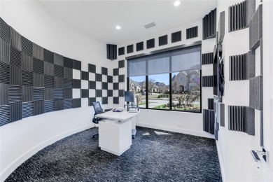 This ultra-modern smart home, on a rare double golf course lot on The Trails of Frisco Golf Club in Texas - for sale on GolfHomes.com, golf home, golf lot