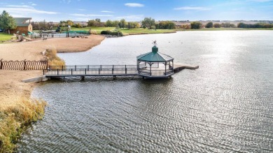 Beautiful end-unit townhome in sought-after Water Valley with a on Pelican Lakes Golf and Country Club in Colorado - for sale on GolfHomes.com, golf home, golf lot