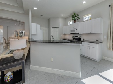 Desirable, turn-key furnished, this light-filled David Hunihan on The Venice Golf and Country Club in Florida - for sale on GolfHomes.com, golf home, golf lot