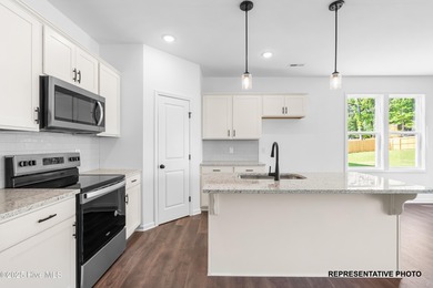 Premium lot! This gorgeous residence highlights classic comforts on Riverwood Golf and Athletic Club in North Carolina - for sale on GolfHomes.com, golf home, golf lot