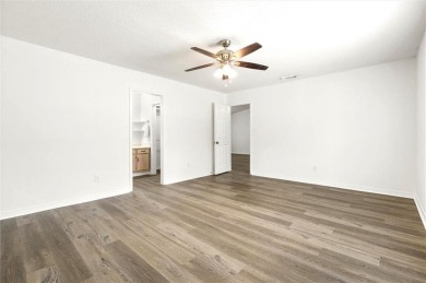 This remodeled 3-bedroom, 2-bath brick home is centrally located on Lake Forest Yacht and Country Club in Alabama - for sale on GolfHomes.com, golf home, golf lot