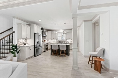 Beautifully designed and custom-built, this two-story brick home on The Dunes Golf and Beach Club in South Carolina - for sale on GolfHomes.com, golf home, golf lot