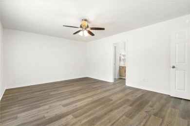 This remodeled 3-bedroom, 2-bath brick home is centrally located on Lake Forest Yacht and Country Club in Alabama - for sale on GolfHomes.com, golf home, golf lot