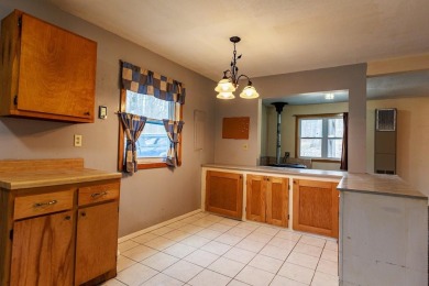 OPEN HOUSE  5/3/25 10AM-1PM Welcome to 6456 Wilderness Drive on Lakes of the North Deer Run Golf Course in Michigan - for sale on GolfHomes.com, golf home, golf lot