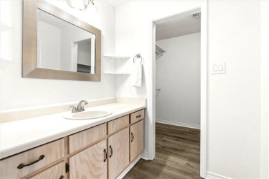 This remodeled 3-bedroom, 2-bath brick home is centrally located on Lake Forest Yacht and Country Club in Alabama - for sale on GolfHomes.com, golf home, golf lot