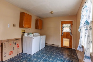 OPEN HOUSE  5/3/25 10AM-1PM Welcome to 6456 Wilderness Drive on Lakes of the North Deer Run Golf Course in Michigan - for sale on GolfHomes.com, golf home, golf lot