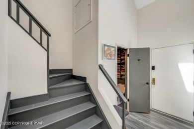 Showcasing lakeview luxury townhome in picturesque Pinecrest on Pinecrest Lake Golf and Country Club in Pennsylvania - for sale on GolfHomes.com, golf home, golf lot